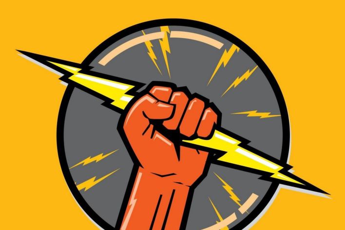 Person Holding White Ceramic Coffee Cup Leaning on Brown Wooden Table